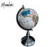 Globe terrestre en pierre précieuse de 220 mm (hauteur de 420 mm) sur socle en nacre blanche.