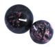 Rhodonite spheres in 70-130 mm originating from Madagascar.