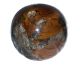 Teak Sphere with Rockcrystal on standard from Myanmar (Burma)