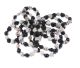 Howlite bracelet with white & black Onyx skulls