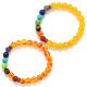 Chakra bracelet of gemstone beads with amber beads one size fits all.