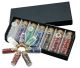 7 glass bottles with chakra symbols and gemstones. In a luxury case.