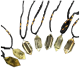 Citrine point necklace 30-40 mm hung on black and gold cord.