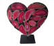 Heart, artwork made of resin and agate discs on pedestal.
