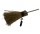 Lucky broom with pentagram symbol and black natural crystal.