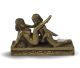 Kamasutra statue in bronze color.
