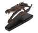 Krokodil bruin van brons op houten voet.