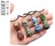 Fist, pendant made of gemstone, the symbol of strength and resistance. In various gemstone types.