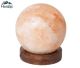 XXL Sphere salt lamp made of pure Himalayan salt. Placed on a beautiful wooden base and equipped wit