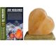 Heart salt lamp made of pure Himalayan salt. Placed on a beautiful wooden base and equipped with ele