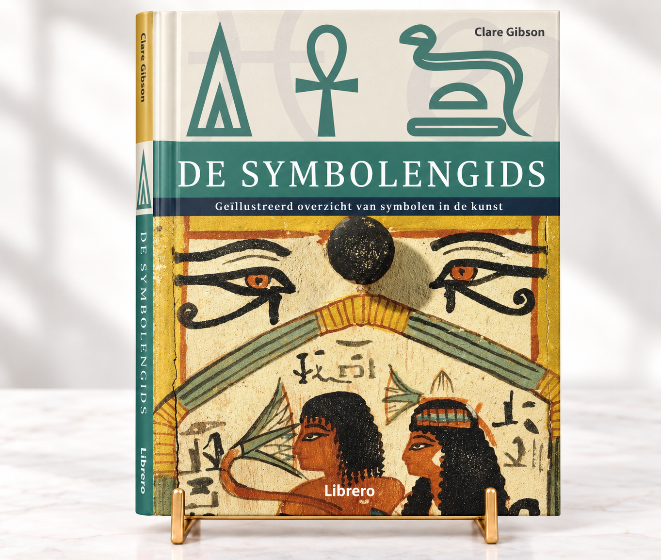 Le guide des symboles sur un présentoir à livres dorés